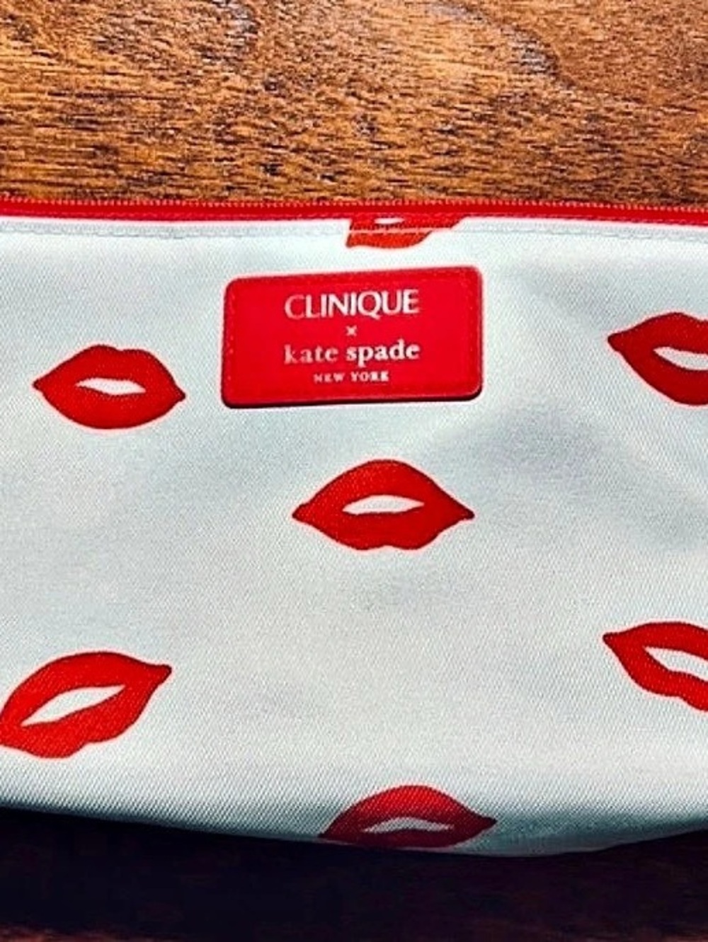 Clinique x kate spade New York lip print cosmetic pouch